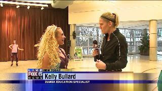 Laura learns about Zumba class at the Zoo