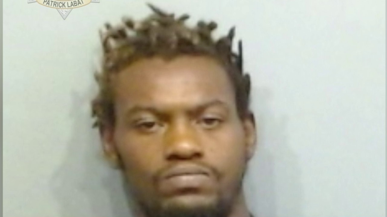 Mugshot released for man accused of shooting APD officer