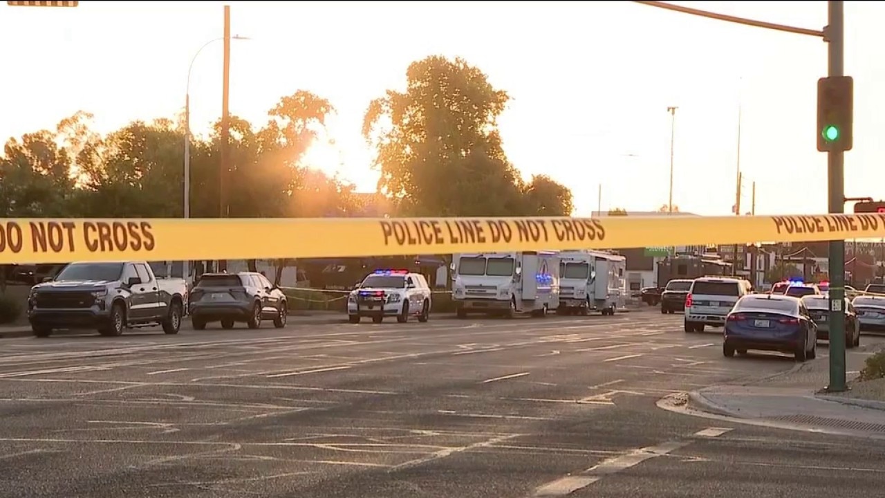 Armed woman shot by officers in east Phoenix