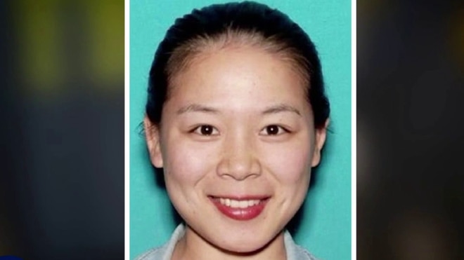 Woman accused of spying for China