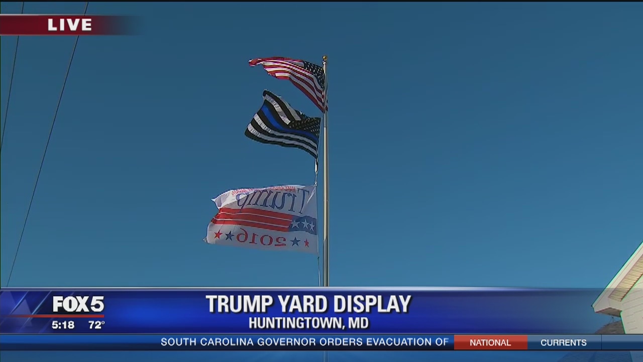 Woman fights back after someone rips down her flagpole flying Trump flag