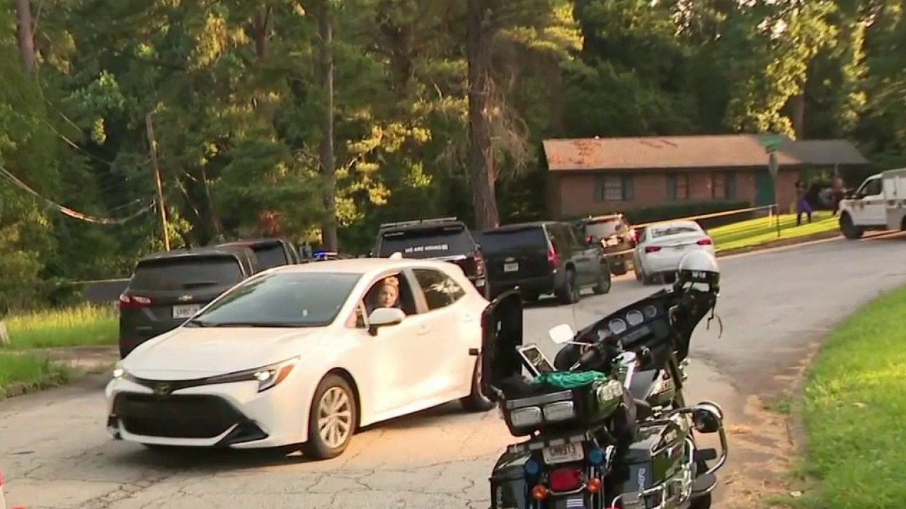 Police remain on scene of double shooting in DeKalb County