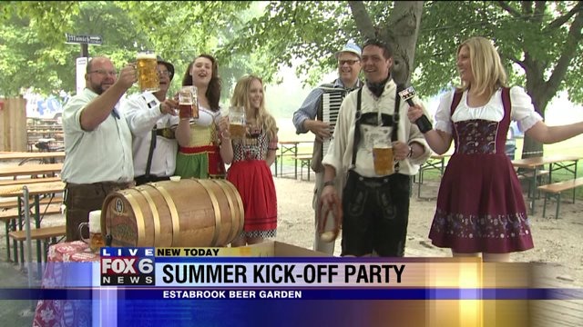 Laura tries to tap the keg