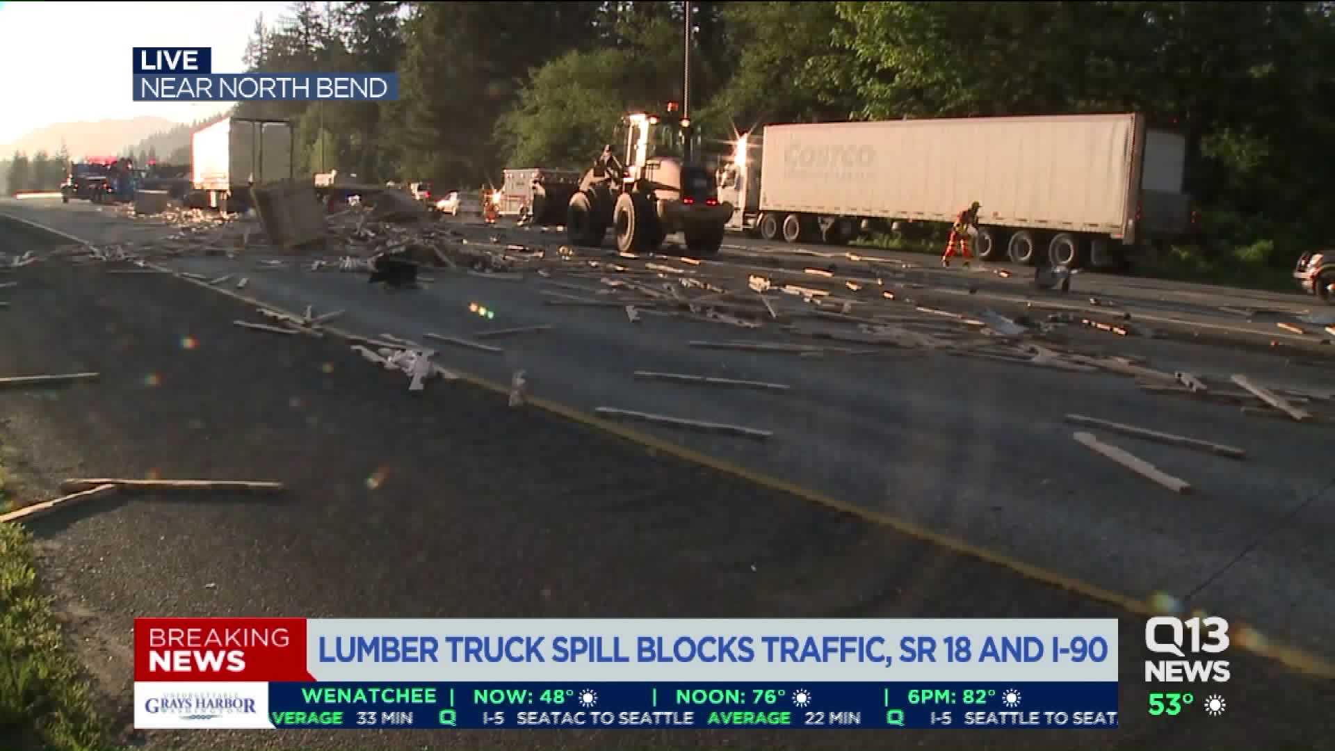 I-90 east closed at SR 18 after 2 rigs crash spilling lumber across freeway