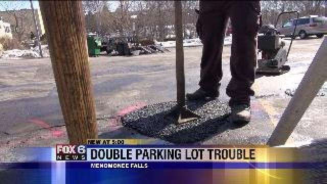 Repairing the parking lot at Menomonee Falls pub twice