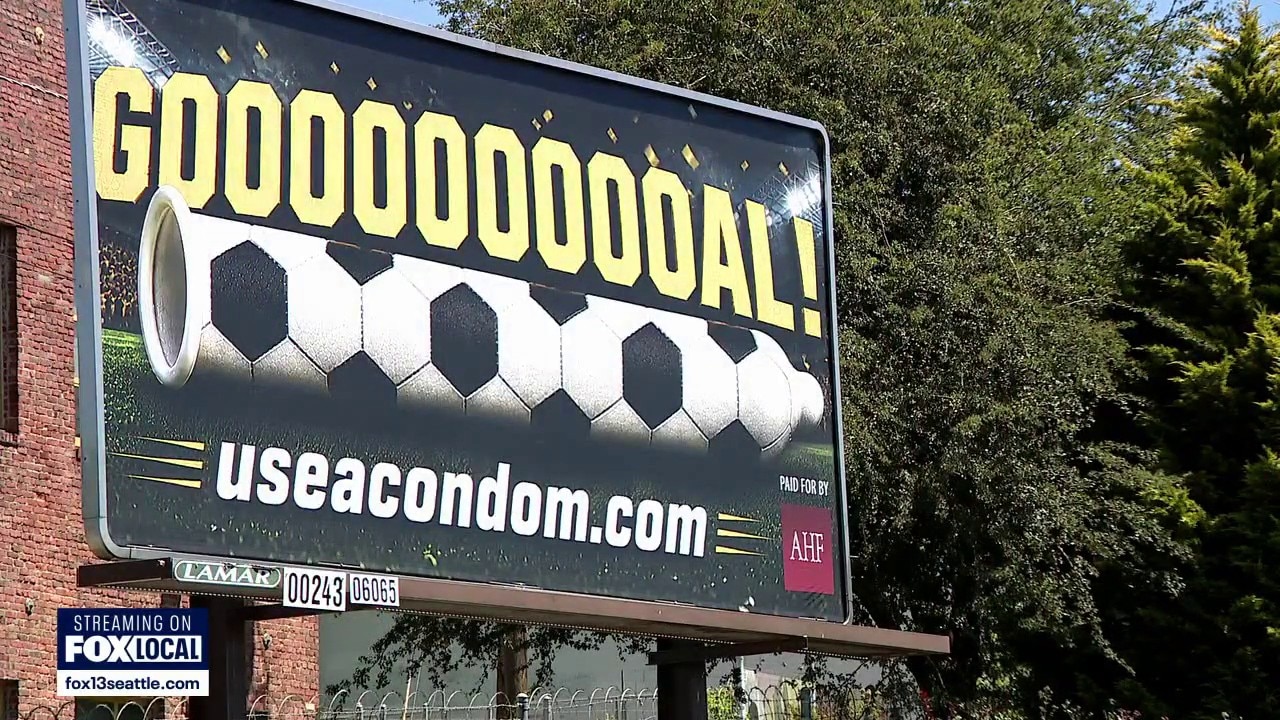Giant condom billboard greets Seattle soccer fans
