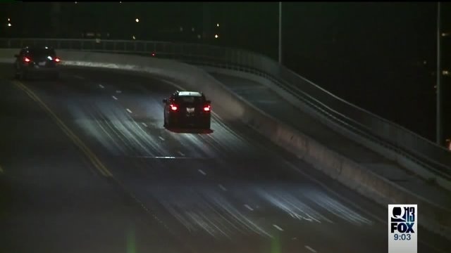Road crews de-icing streets as temps fall