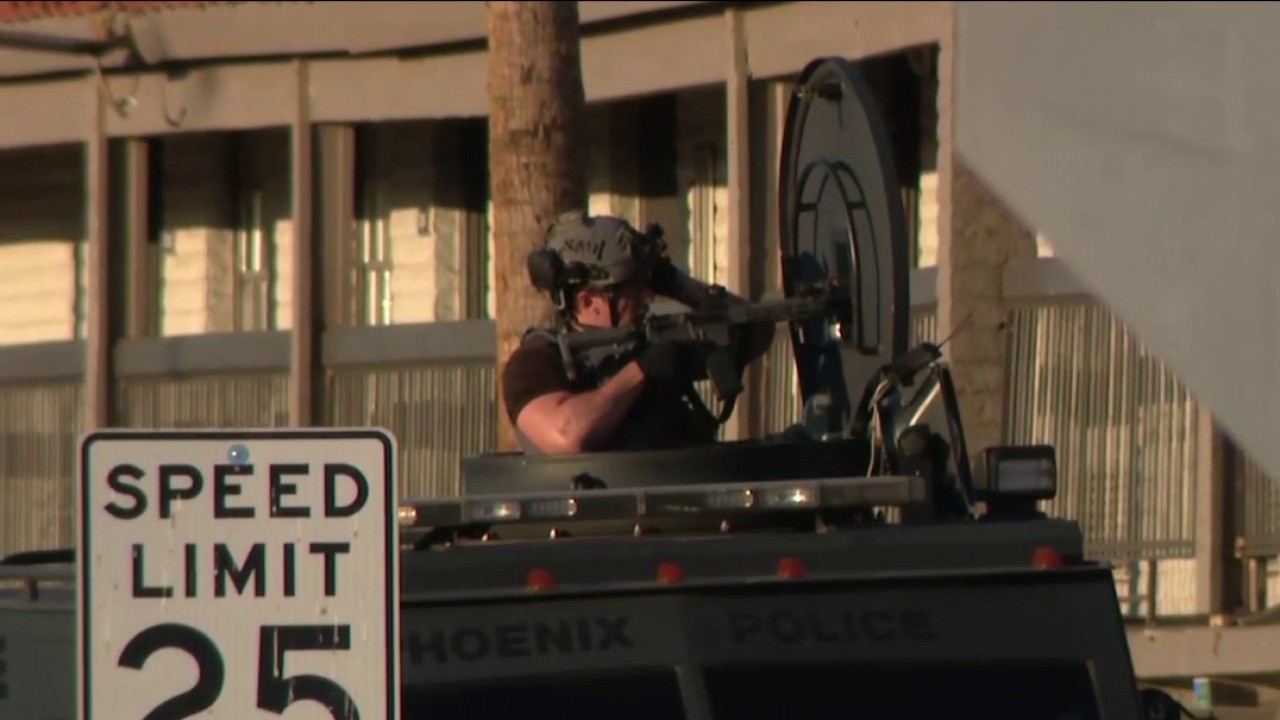 1 hurt, 2 detained after shooting at Phoenix motel