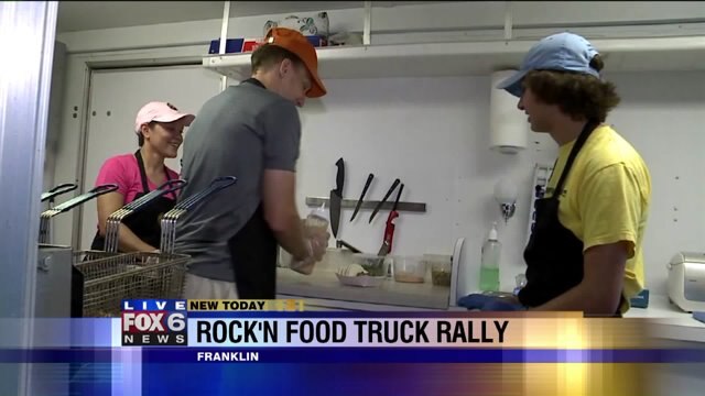 Carl helps prepare food that will be served during Rock`n Food Truck Rally