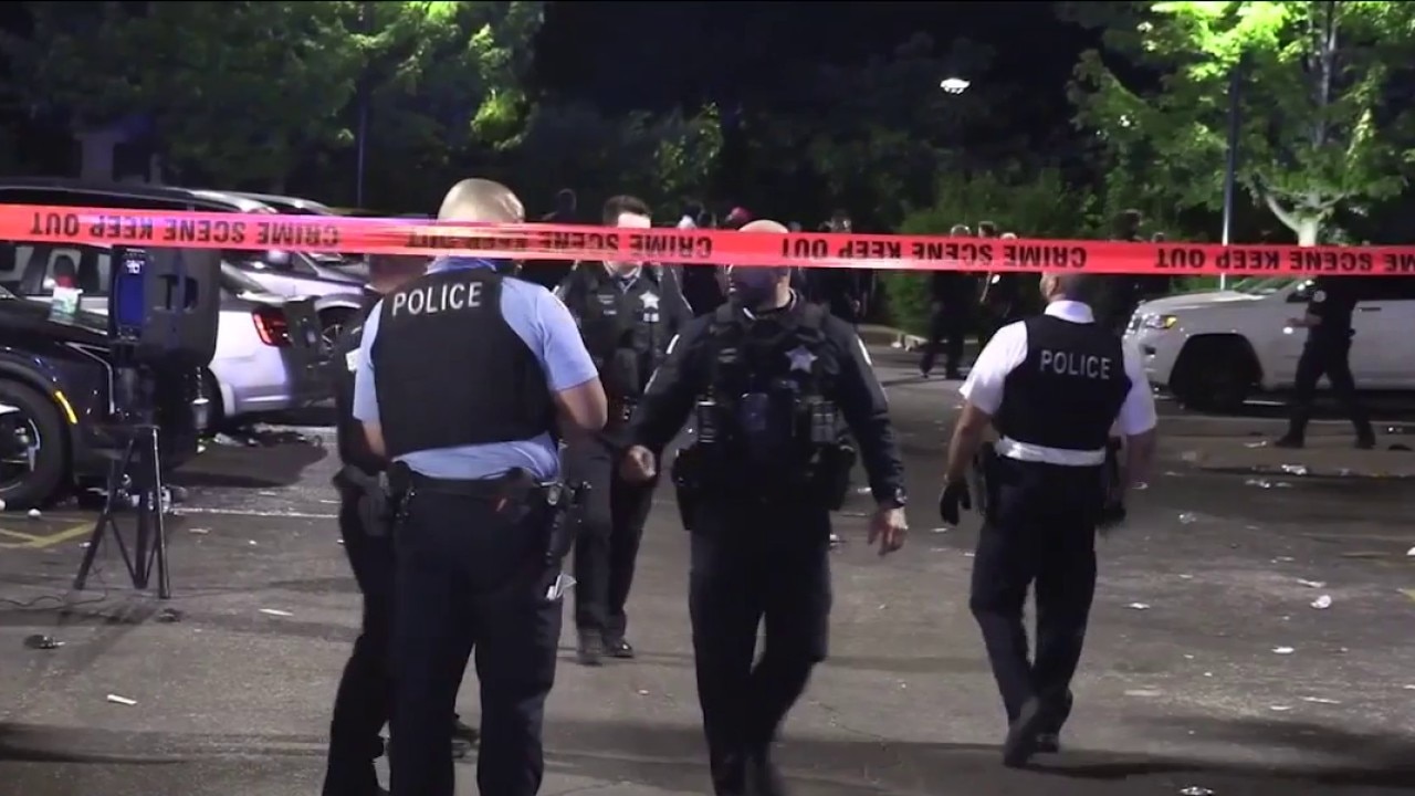 Dozens shot, officers hurt in Memorial Day weekend violence