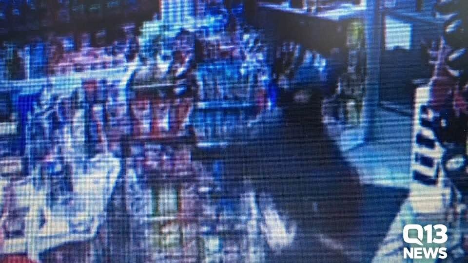 Video shows customer save clerk from being shot