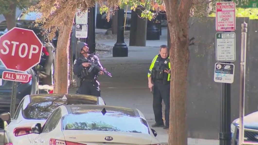 Gun shots ring out during SWAT standoff in Midtown