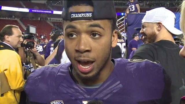 Huskies beat Buffaloes 41-10 for Pac-12 title