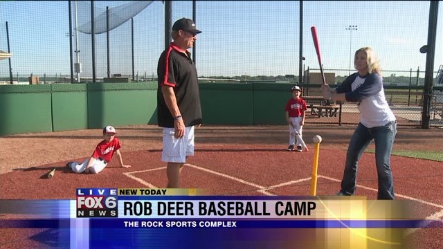 Rob Deer teaches Laura the basics of hitting