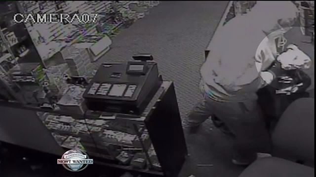 WANTED: Armed smoke shop robber