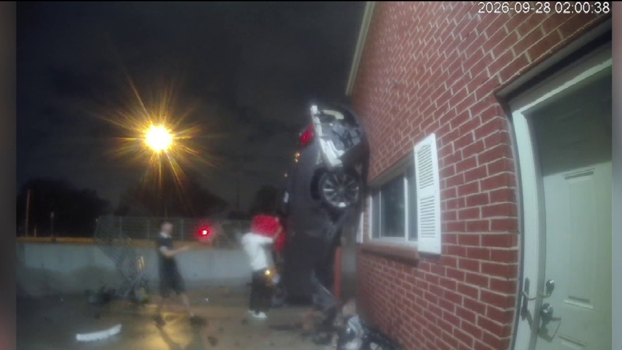 Security video captures car crashing into Far North Dallas building before catching fire