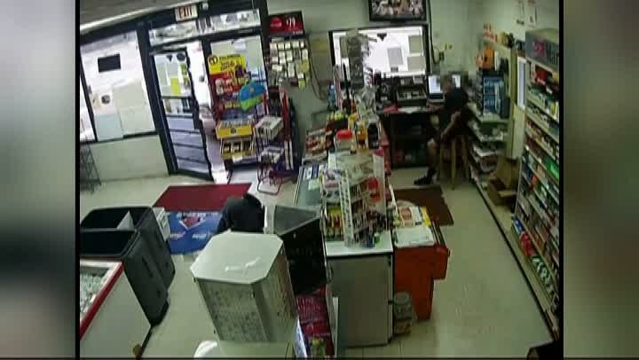 Texas clerk fights robber caught on video