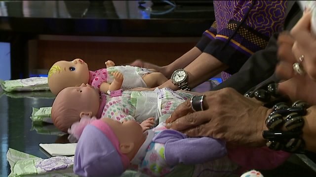 The hosts try to beat mark Zuckerberg`s diaper-changing record