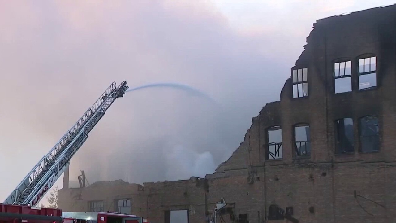 Woman charged for Milwaukee warehouse fire