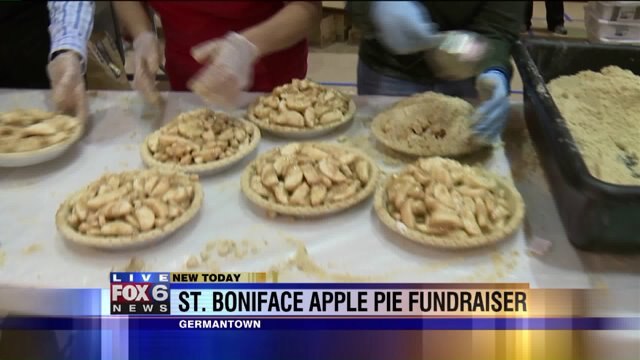 The final stage: Carl helps put together apple pies
