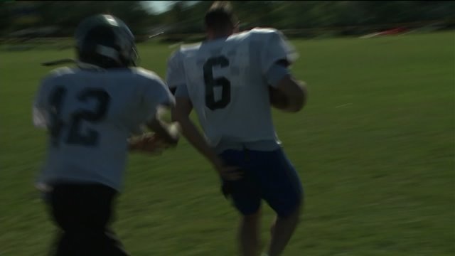 Chip participates in a drill as he hangs with the Brown Deer Youth Football team