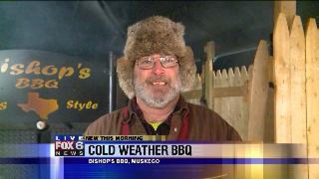 One restaurant grilling in cold weather