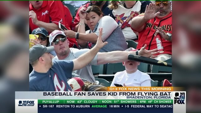 Hero fan saves boy from getting clobbered in face by flying baseball bat