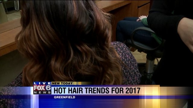 The finished product: Carl checks out variety of new hair style trends