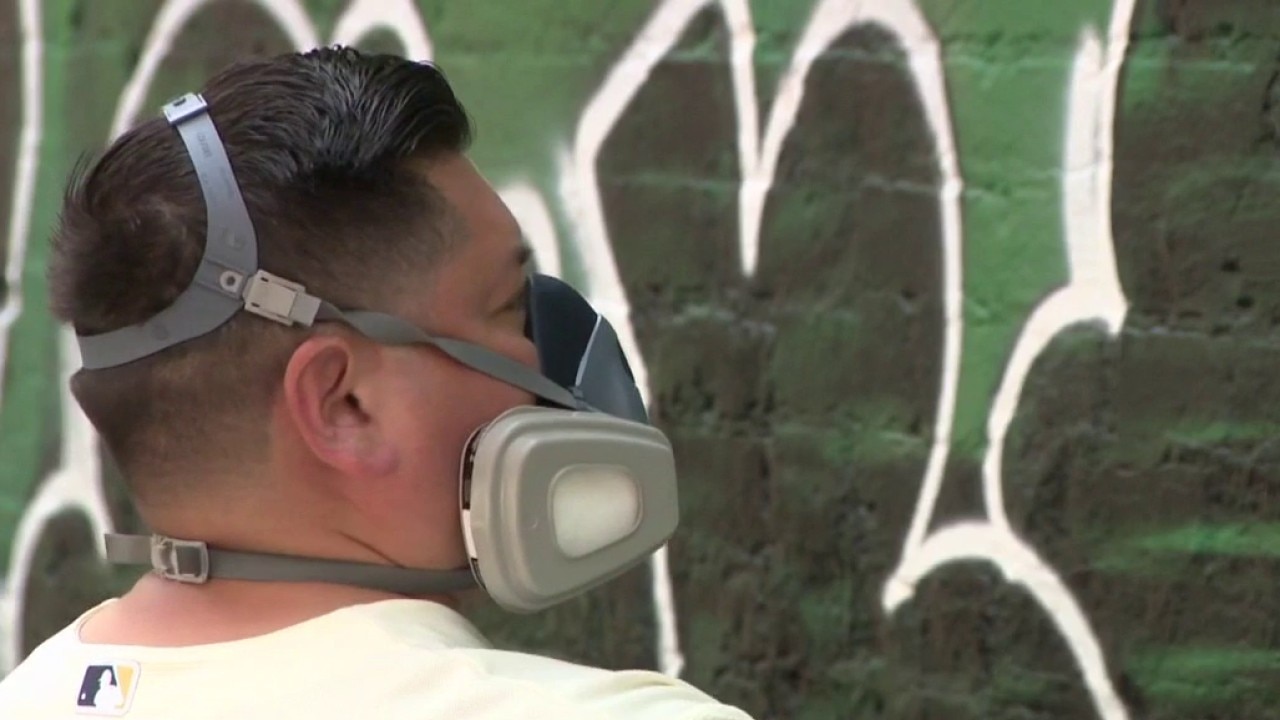 Milwaukee Giannis mural vandalized; artist touches up damaged art