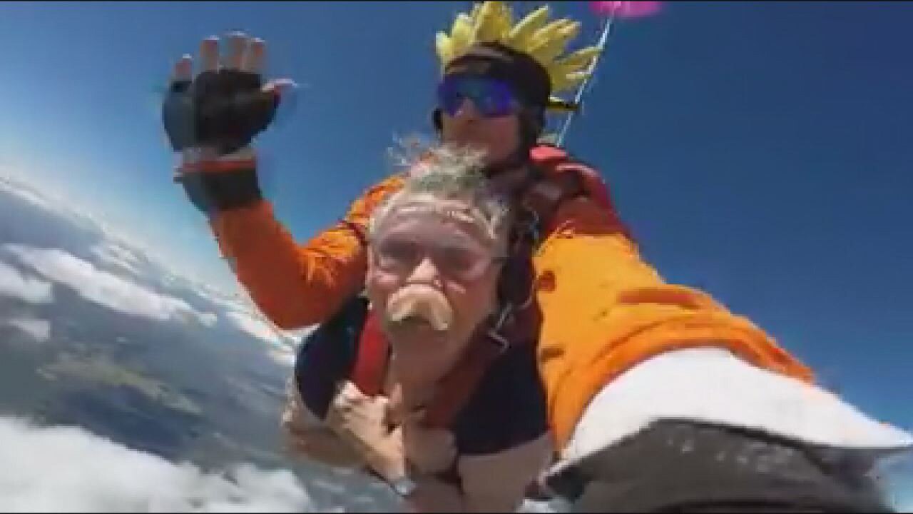 Skydiver's dentures hit instructor in head