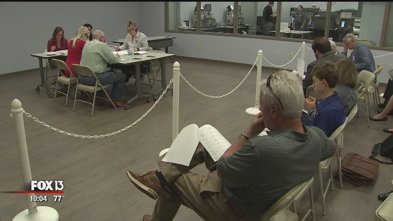 Workers pull long days in Florida's election recount