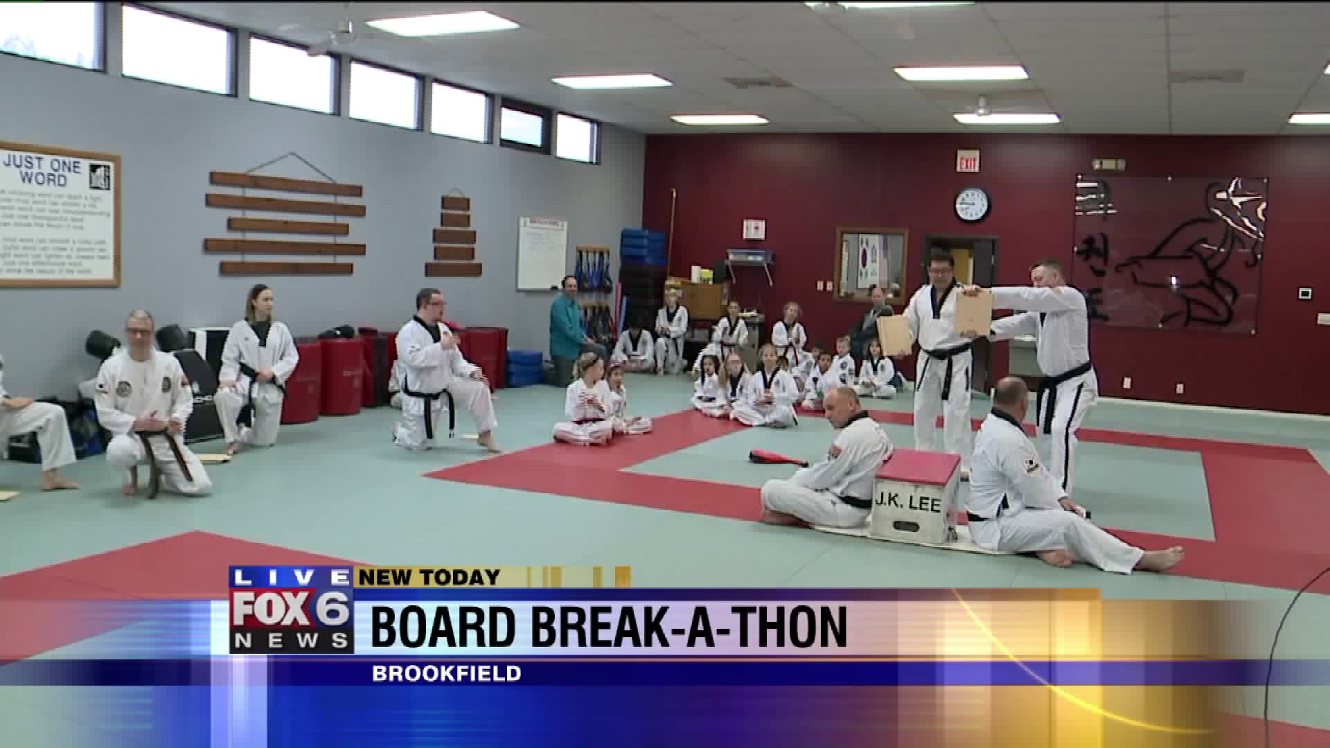 Carl gets details on J.K. Lee Board Break-A-Thon