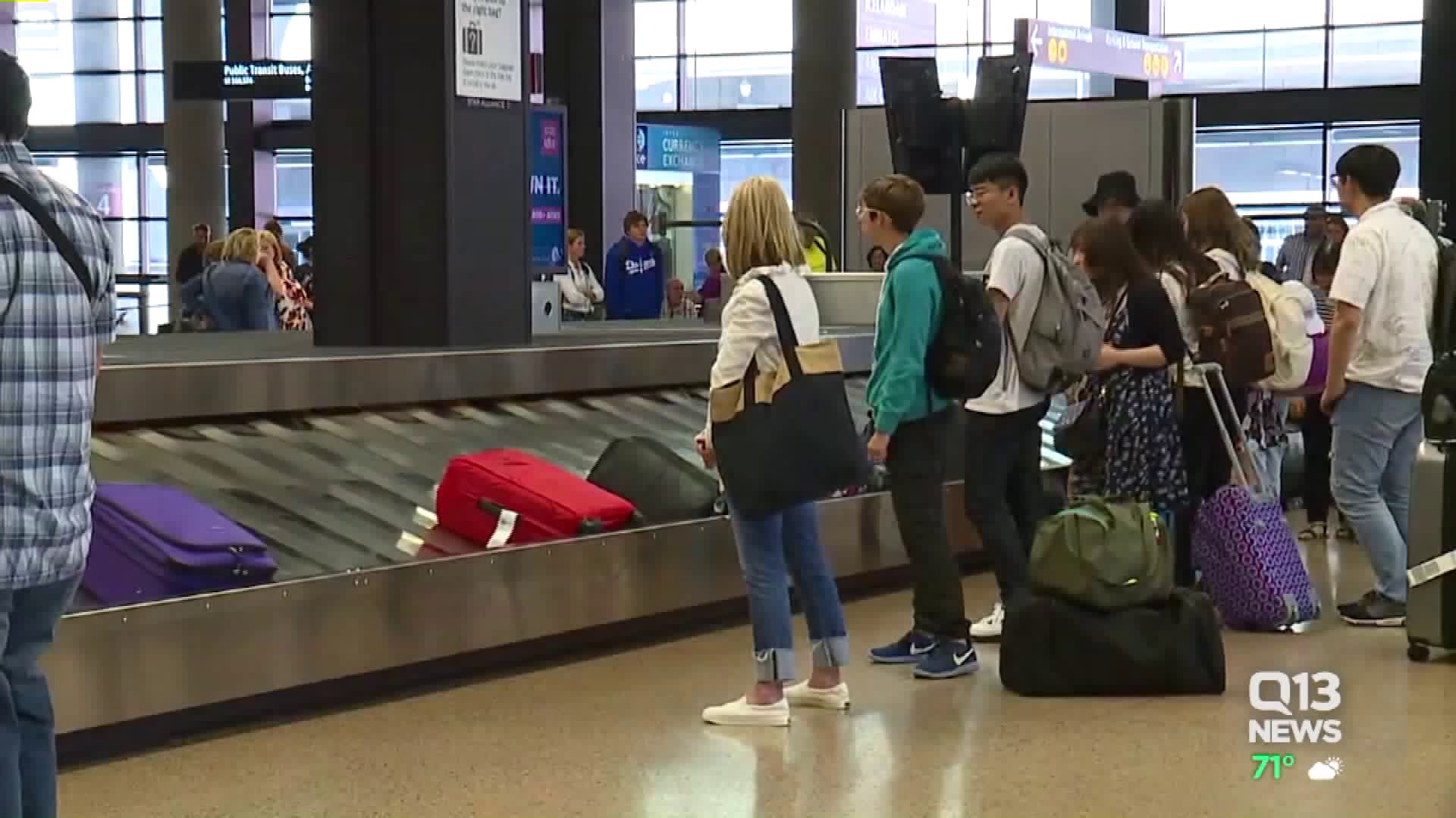 Sea-Tac quiet this time as Trump travel ban goes into effect