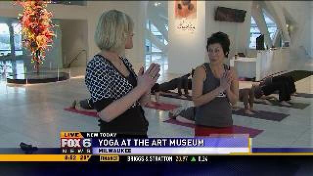 Laura does yoga at the Milwaukee Art Museum