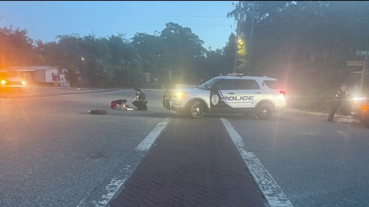 Police cruiser hits man in crosswalk, officials say