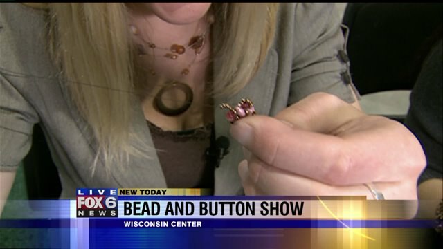 Laura gets a lesson in making jewelry