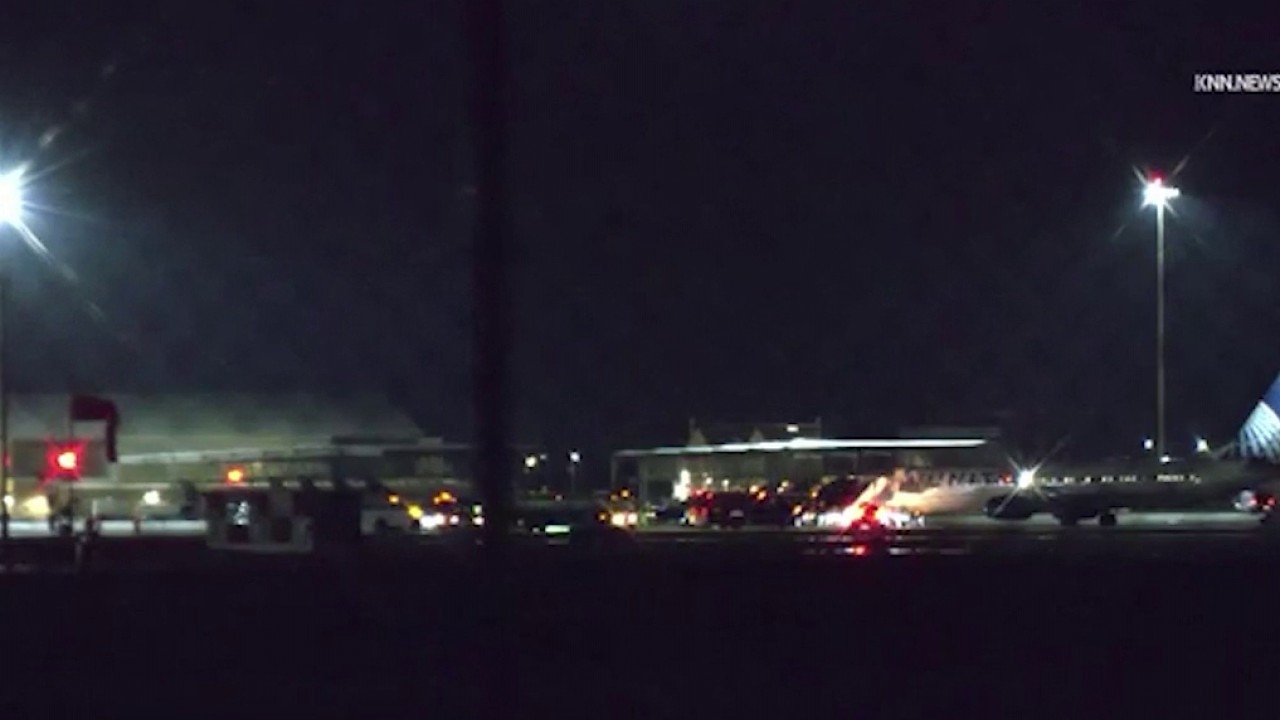 Flight lands at Luke Air Force Base during monsoon