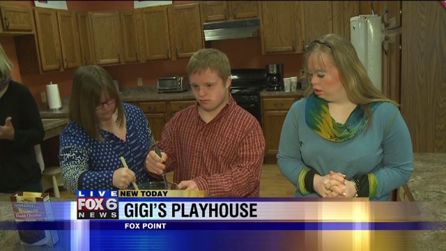 Julie learns about the different programs offered at GiGi`s Playhouse