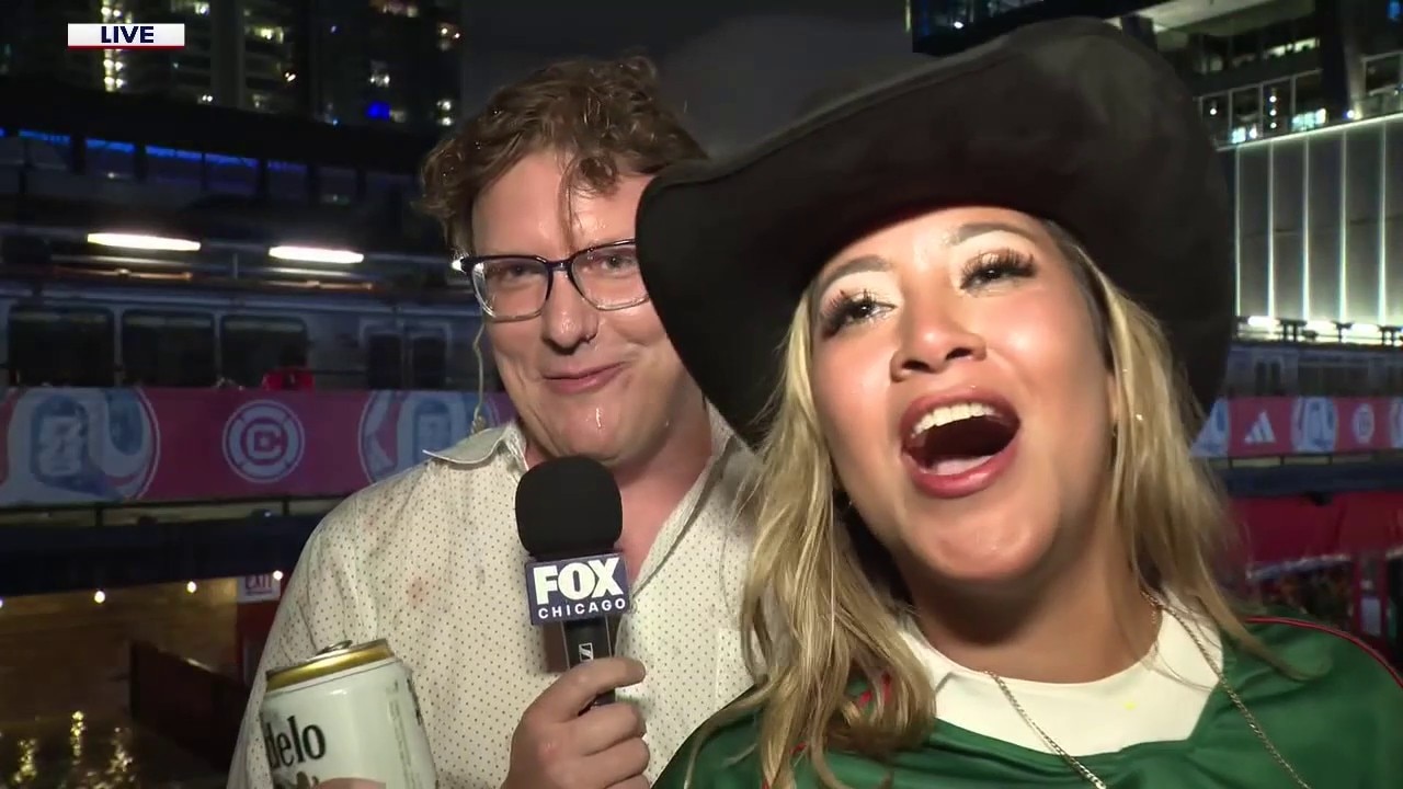 Fox Chicago Reporter Sam Panayotovich gets doused with beer 