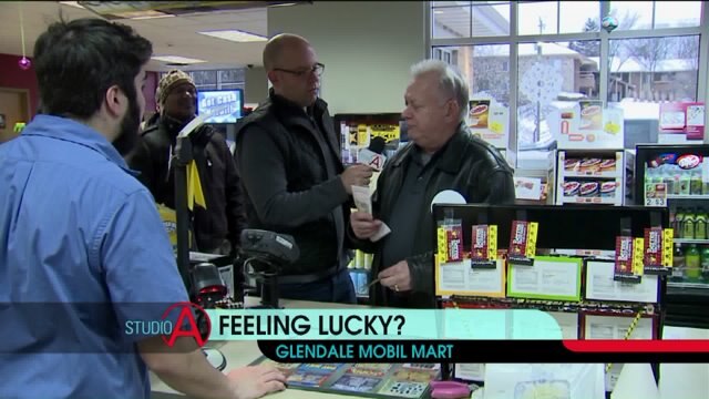 Powerball mania! Brian Kramp at Mobil station in Glendale ahead of big drawing