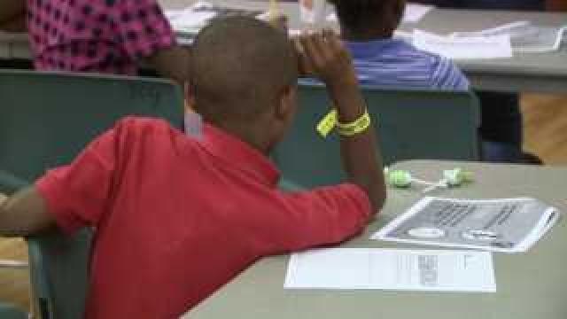 Kids learn at Camp Economy
