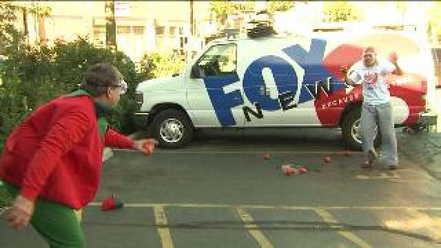 Laura has a tomato fight