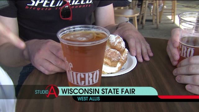 Kramp finds folks enjoying Cream Puffs at the Wisconsin State Fair!