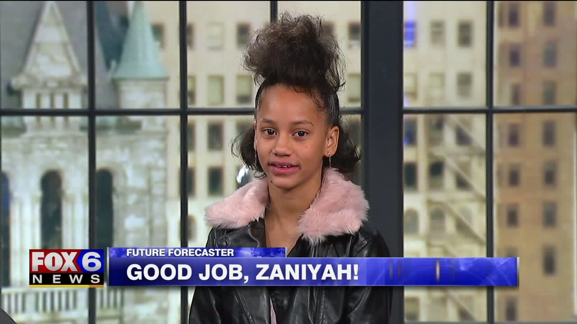 Zaniyah helps with the weather