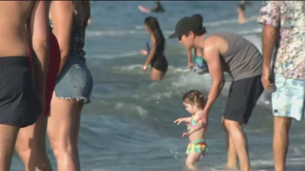 Bay Area beach goers soak up the sun