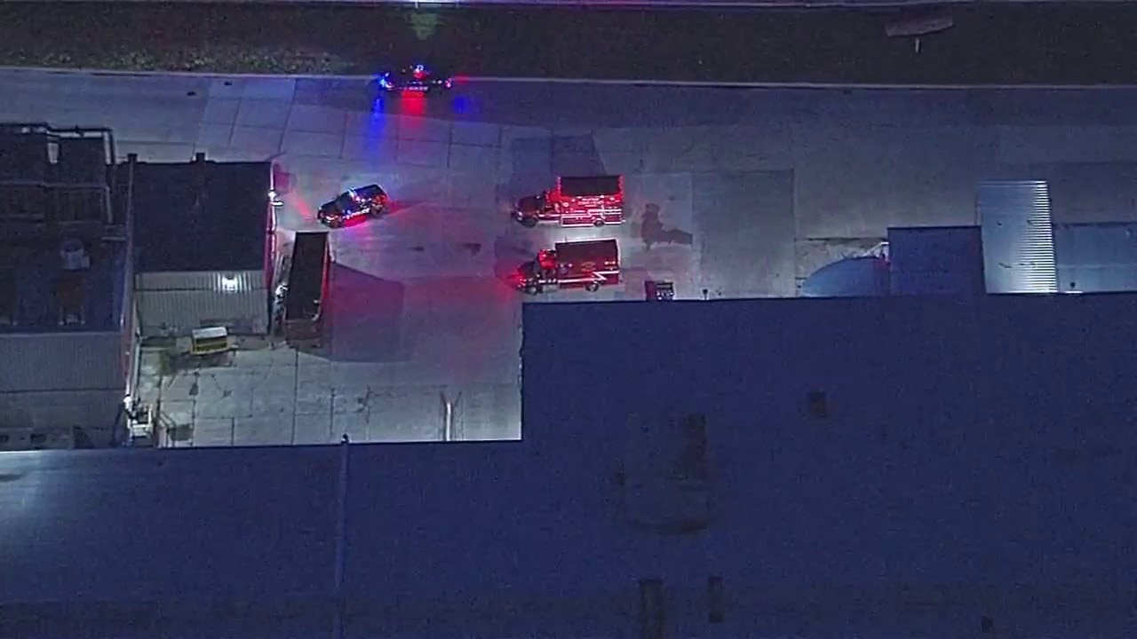 Emergency vehicles outside Ford plant in Wayne