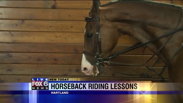 Kramp learns to ride a horse at Knollwood Farm