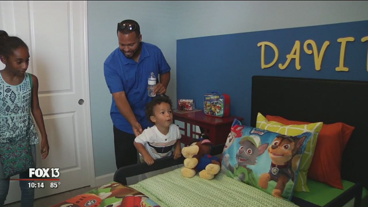 Injured Army Sgt. gets keys to mortgage-free home