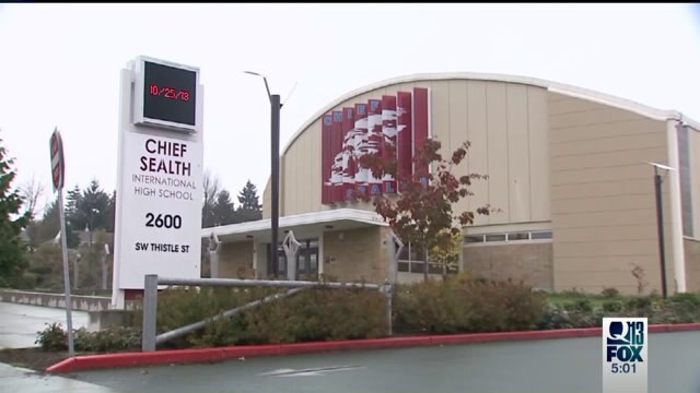 Woman arrested for allegedly having gun at school