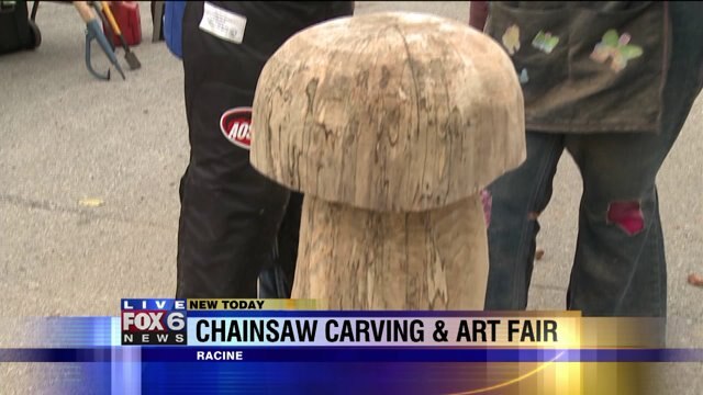 Laura gets details on Chainsaw Carvings & Art Fair